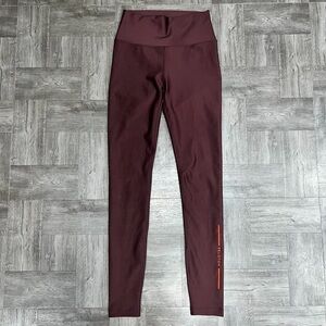 Peloton “Show Up” Burgundy Leggings Size Small